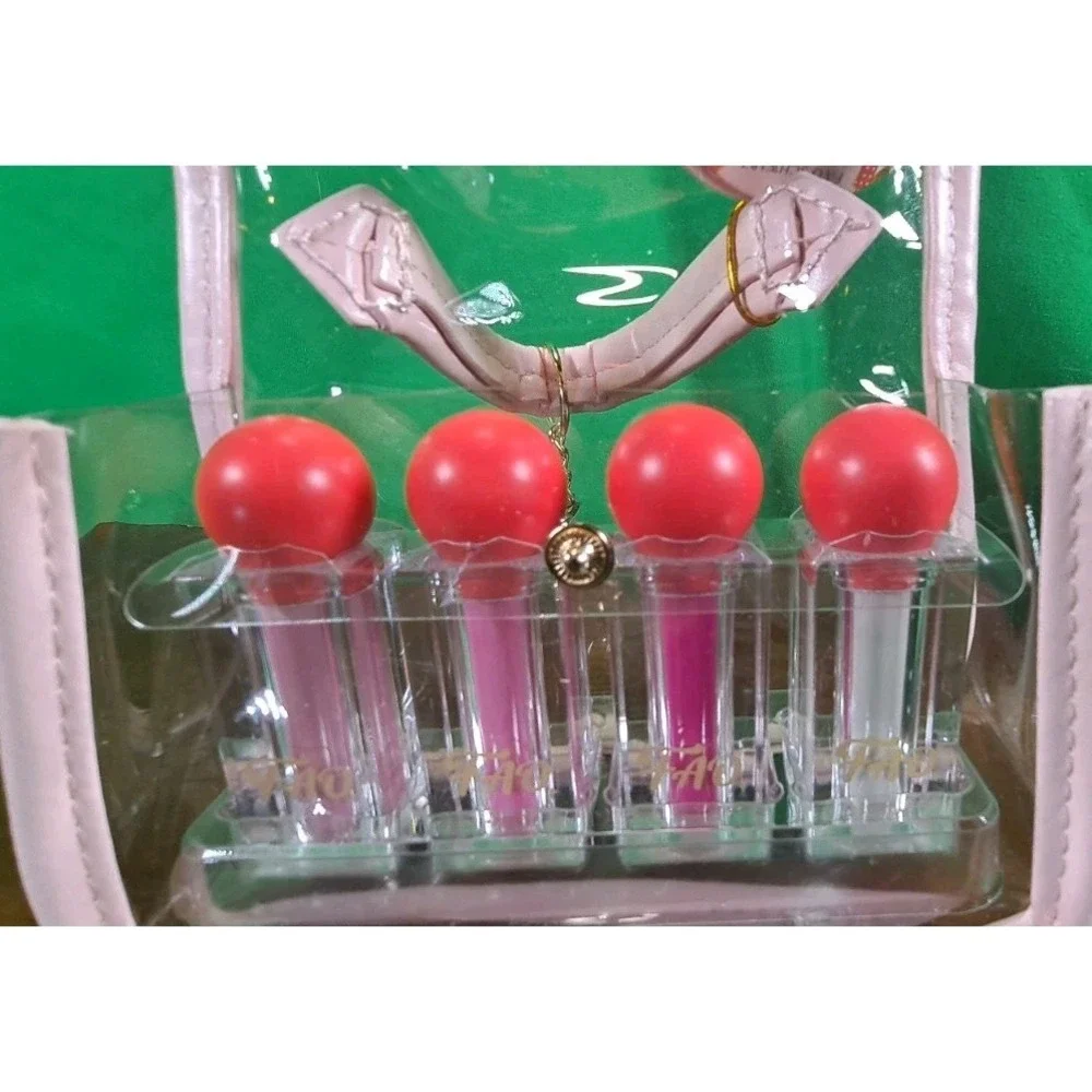 NIP FAO Schwarz Lipstick Set - 4pc with a Pink and Clear Purse - Pink Lilac Silv